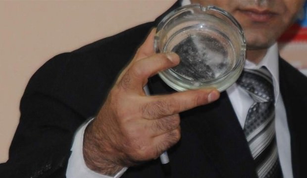 Eşine attığı kül tablası silah sayıldı
