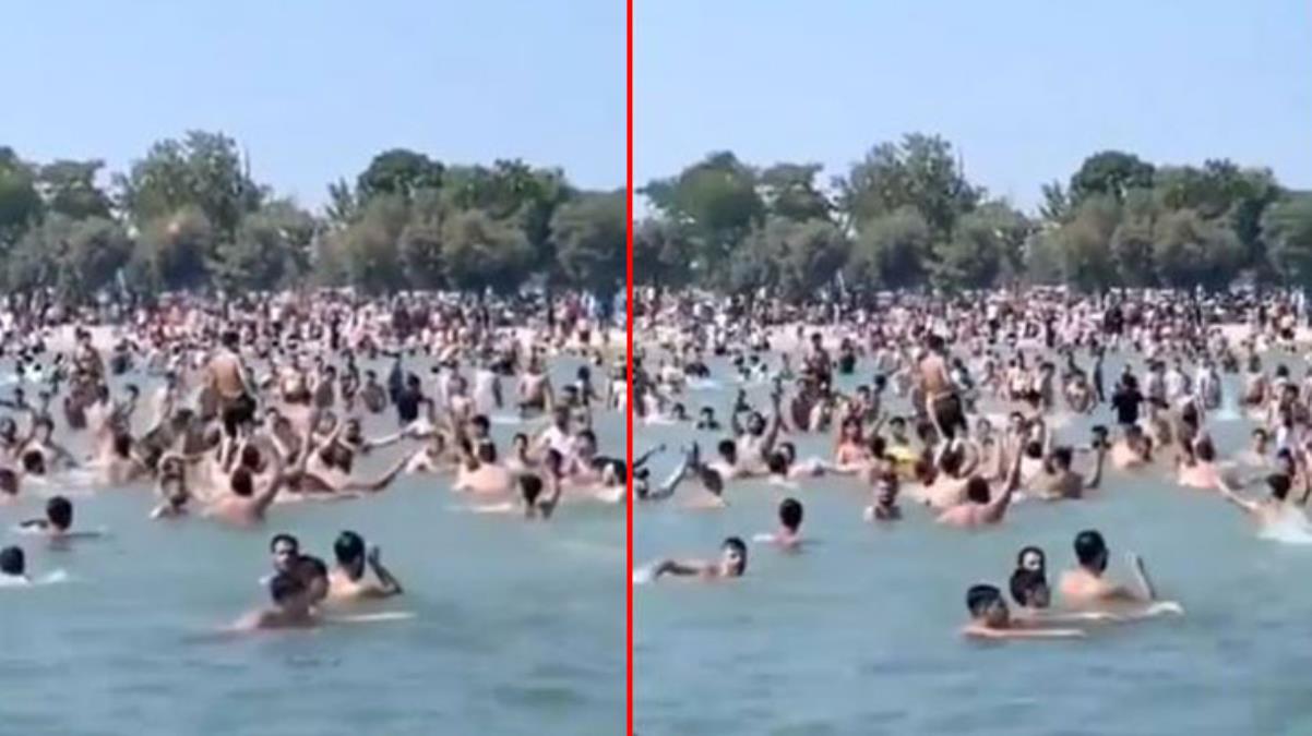 İstanbul'un göbeğindeki plajda ilginç anlar! Suriyeliler 'Allahu Ekber' diye bağırıp denizde eğlendiler